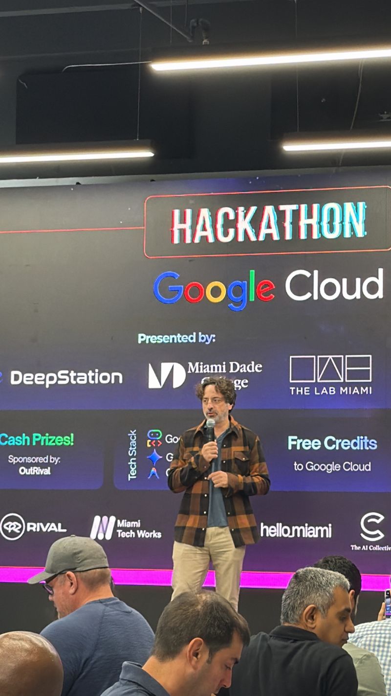 Google co-founder Sergey Brin speaking on stage at The LAB Miami during the Google Cloud Hackathon